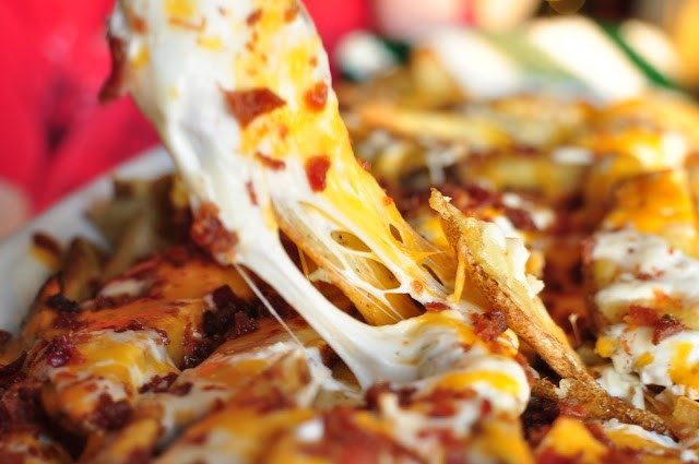 Banish boring potato sides and give your next party a punch by making one of these flavorful potato wedge recipes. 10 Flavorful Potato Wedge Recipes ~ Tipsaholic.com #sides #potato