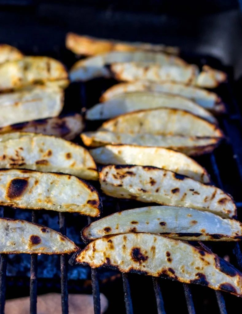 Banish boring potato sides and give your next party a punch by making one of these flavorful potato wedge recipes. 10 Flavorful Potato Wedge Recipes ~ Tipsaholic.com #sides #potato