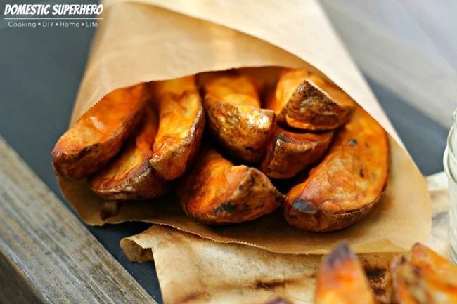 Banish boring potato sides and give your next party a punch by making one of these flavorful potato wedge recipes. 10 Flavorful Potato Wedge Recipes ~ Tipsaholic.com #sides #potato