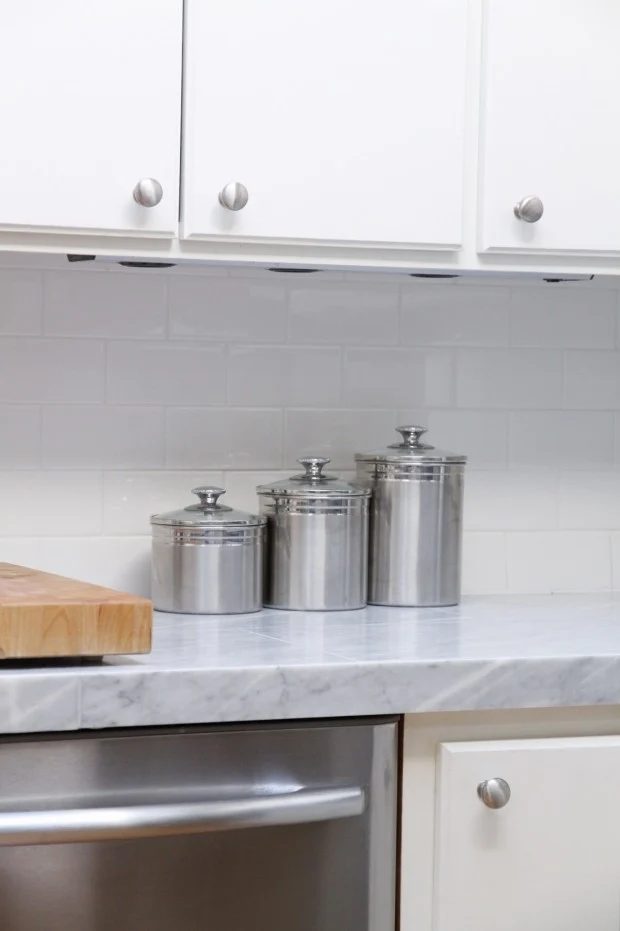 If you love the look of Carrera marble countertops, get the look for less with this tiled Handmade marble countertop walkthrough. It's a striking, modest-cost-friendly alternative!