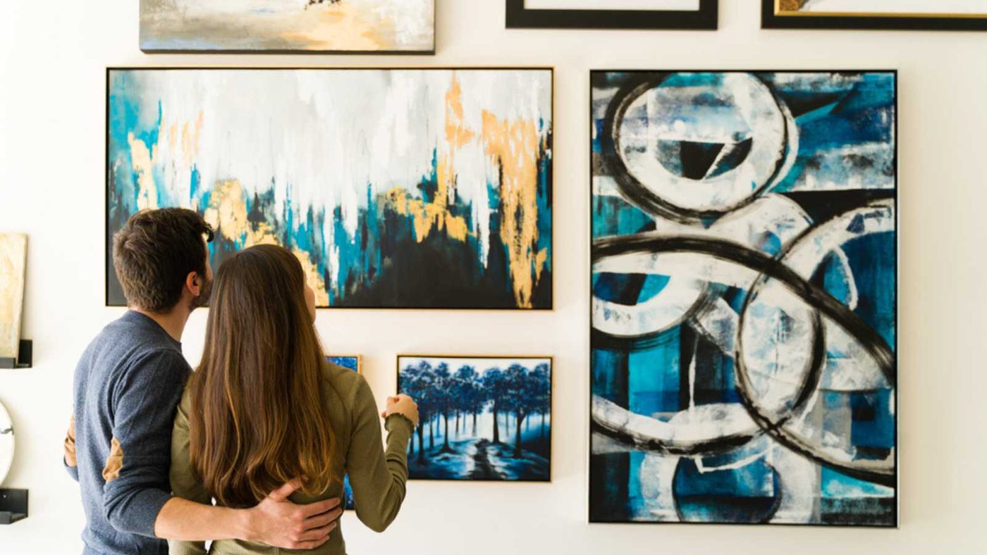 Couples Looking At Wall Art