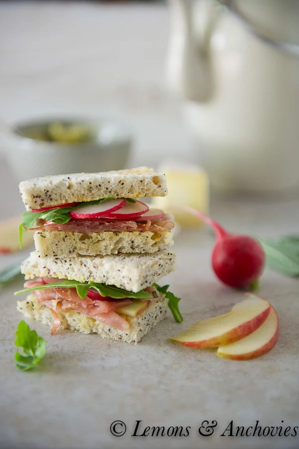 Don't settle for boring appetizers at your next party. Give a buffet table a boost with these ten recipes for delicious tea sandwiches both savory an sweet. 10 Tasty Tea Sandwiches