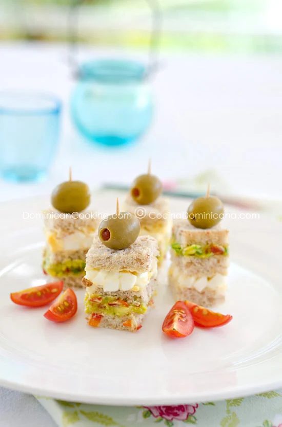 Don't settle for boring appetizers at your next party. Give a buffet table a boost with these ten recipes for delicious tea sandwiches both savory an sweet. 10 Tasty Tea Sandwiches