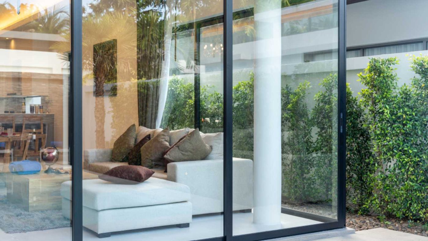 open plan living area with sliding door and garden
