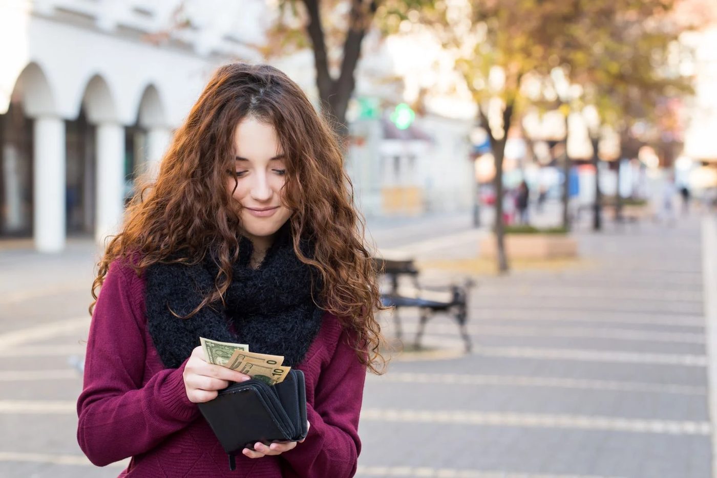 Girl Holding Her Wallet