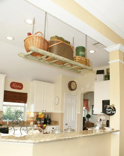 straightforward Ladder Decor options: Hang a Ladder for Overhead Kitchen Storage