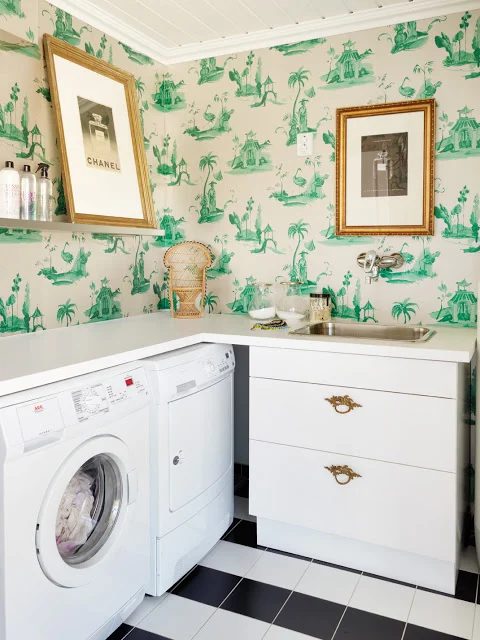 Laundry with stylish wall paper featured in Remodealholic.com's Laundry Room options