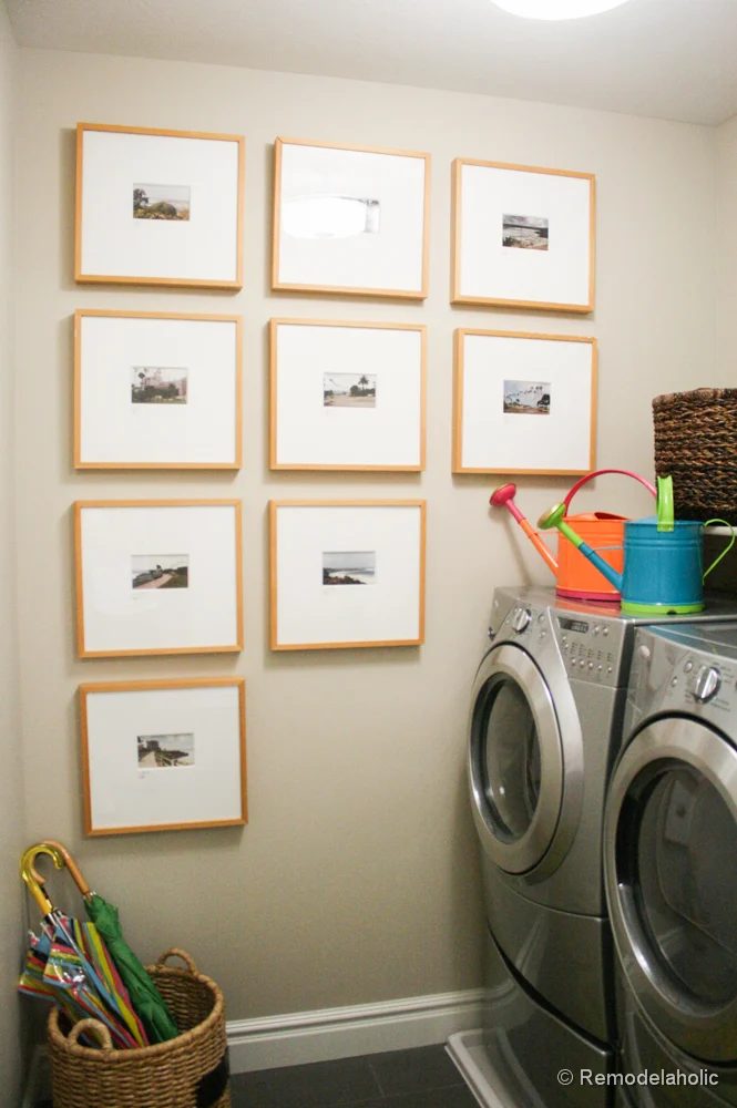 Pretty gallery wall in a laundry room! Fabulous Laundry room design options from @Bekob