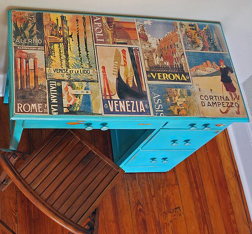 Decoupaged desk using old calendars.