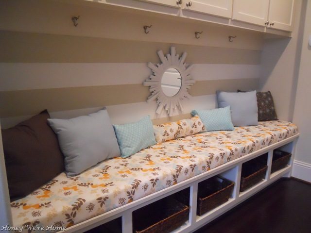 Add a cubby bench for seating and storage in the hallway