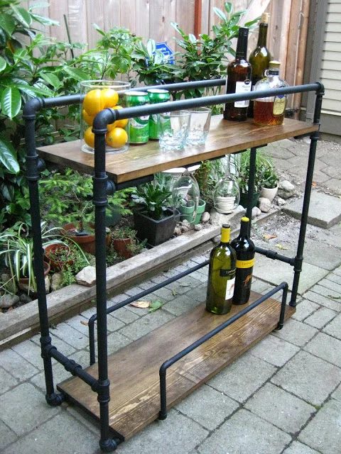 Metal plumbing pipes can be used to build many memorable things, from a clothes rack to a canopy bed! 15 Fabulous Handmade Plumbing Pipe Projects via tipsaholic.com #plumbingpipe #