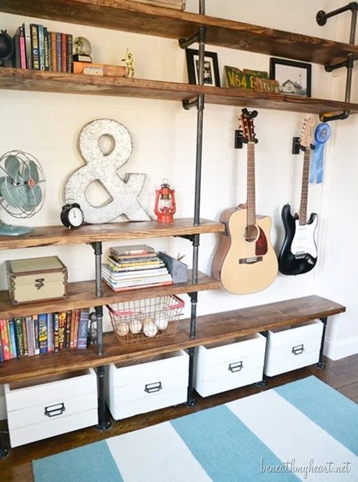 Metal plumbing pipes can be used to build many memorable things, from a clothes rack to a canopy bed! 15 Fabulous Handmade Plumbing Pipe Projects via tipsaholic.com #plumbingpipe #