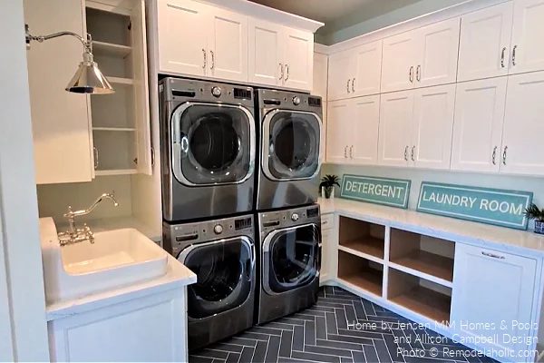 Large White Laundry Room with Double Machines