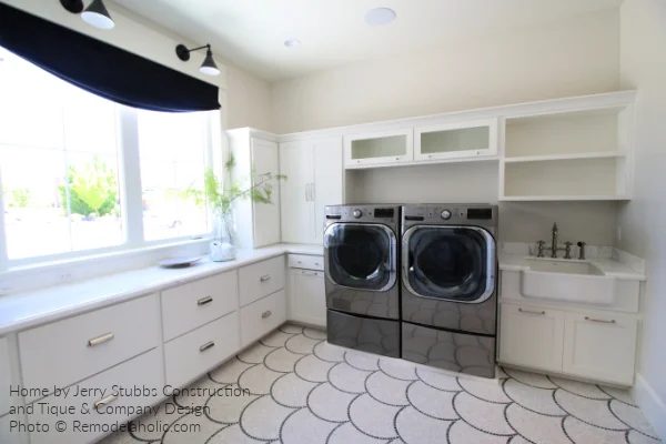 White Laundry Room with Mosaic Tile Floor