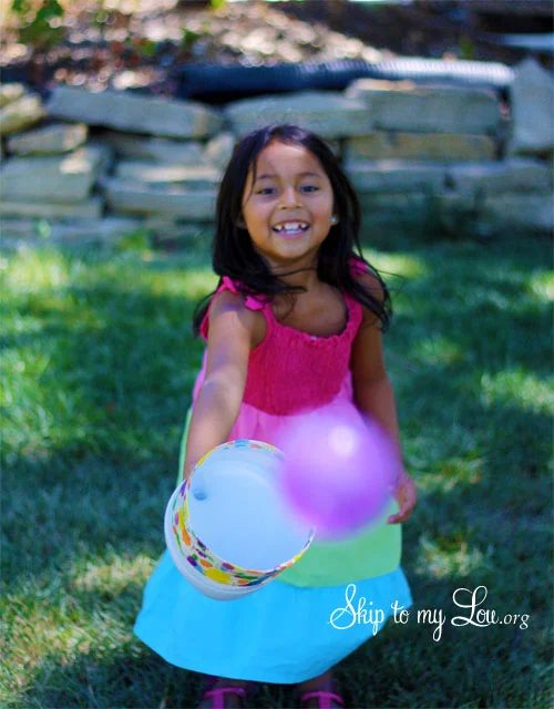 Playing-catch-with-clorox-bottle-catcher