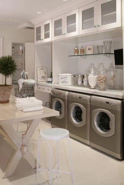 large Laundry room with great storage and multiple machines featured on Bekob.com
