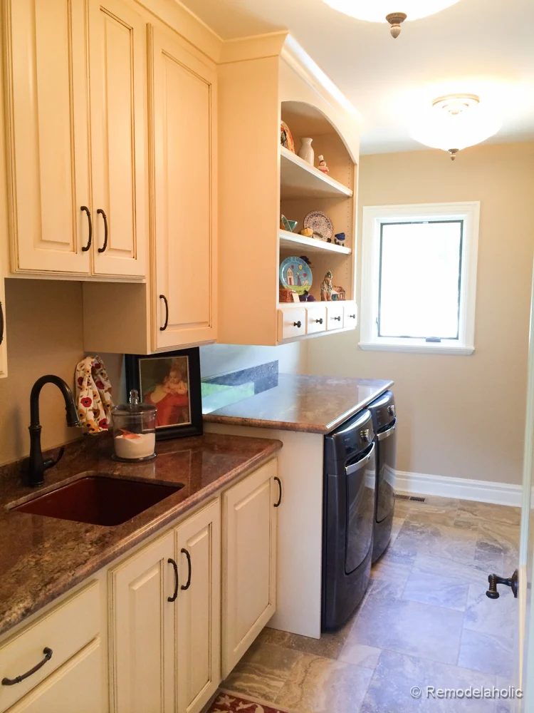 Huge laundry room with sink, cabinets, and folding table. Fabulous Laundry room design options from @Bekob