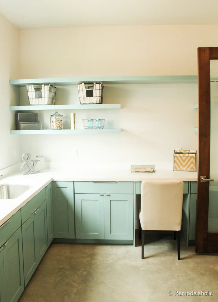 Fabulous Laundry room design options from @Bekob Mint colored cabinets in a large multi-purposed laundry room