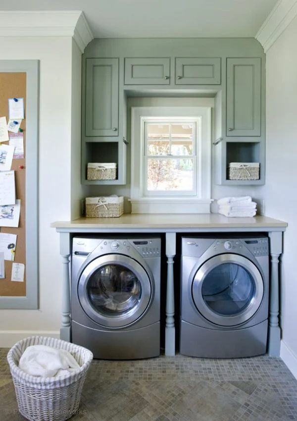 Laundry in corner of a small laundry room featured on Bekob.com