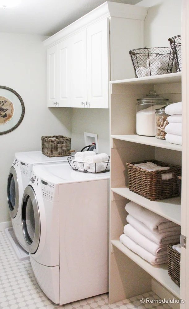Fabulous Laundry room design options from @Bekob Pretty White laundry room with shelves for storage.