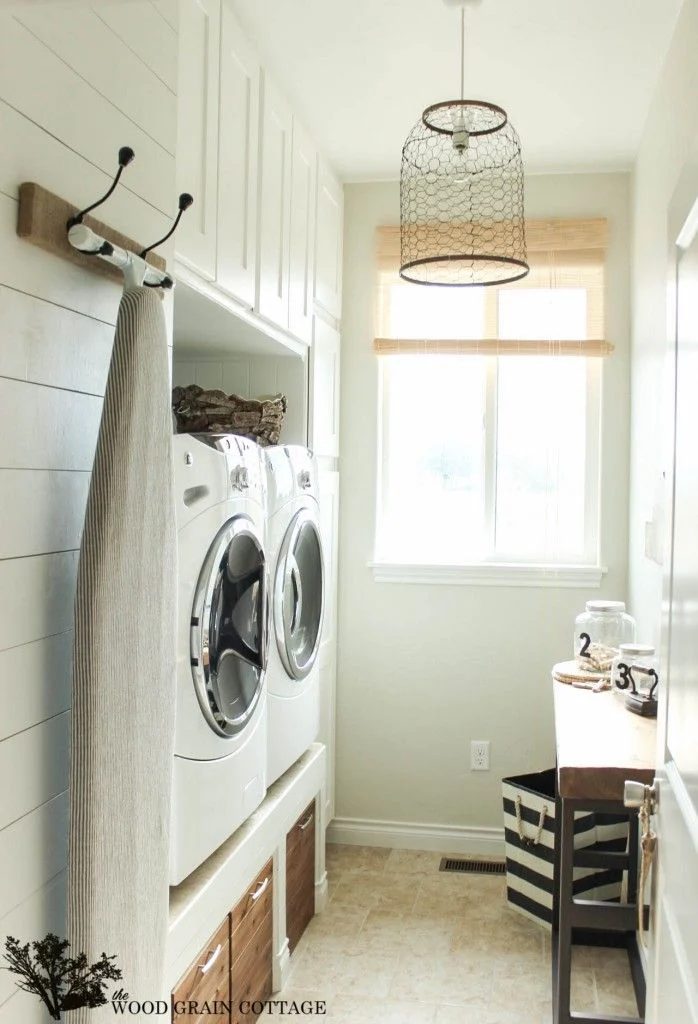 Small Laundry room inspiration with built-ins featured on Bekob.com