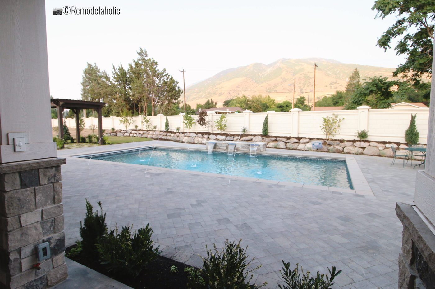 Adding a pergola next to the pool for a place to relax by the pool with some shade, SLPH 2018 Home 6 Bradshaw Homes & Property, Photo by Bekob