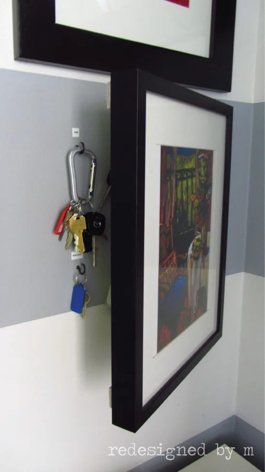 key behind picture frame