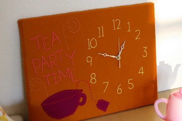 embroidered clock