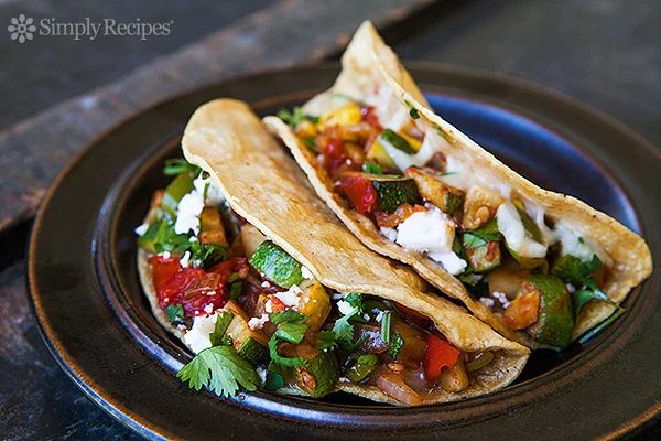 Tacos are the ultimate family meal! Here are 25 delicious taco recipes to try for your Taco Thursday dinners via tipsaholic.com #tacos #taco #tacorecipes #recipes #mexicanfood
