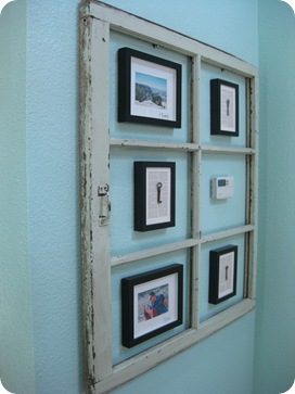 window used as frame for art to hide heater