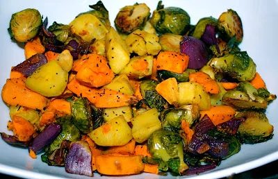 Thanksgiving Side Roasted Sweet Potatoes Yams And Brussels Sprouts