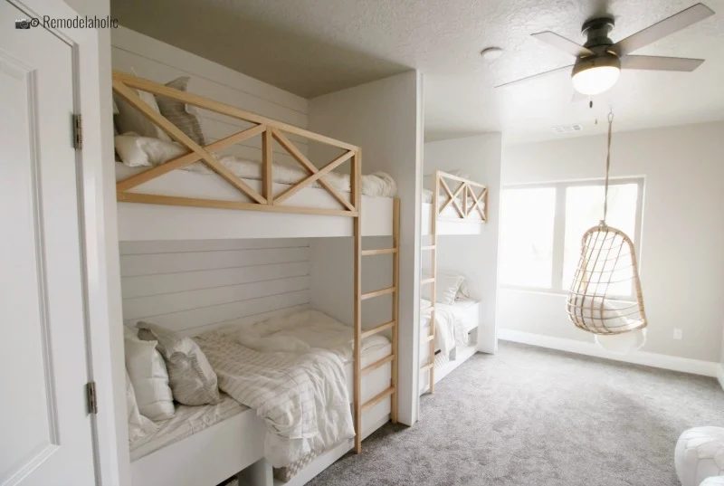 Builtin bunk room with beds and swinging hanging chair, SGPH 2019 House 05 JAR Real Estate Development, photo by Bekob.com