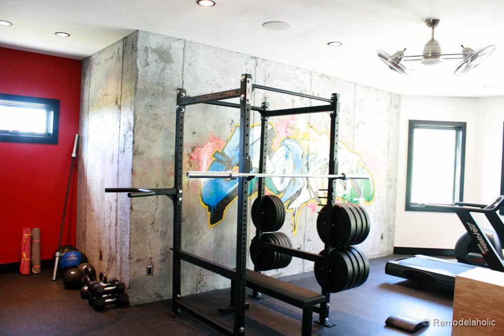 wall painting options, modern graffiti painted wall mural in basement exercise workout room