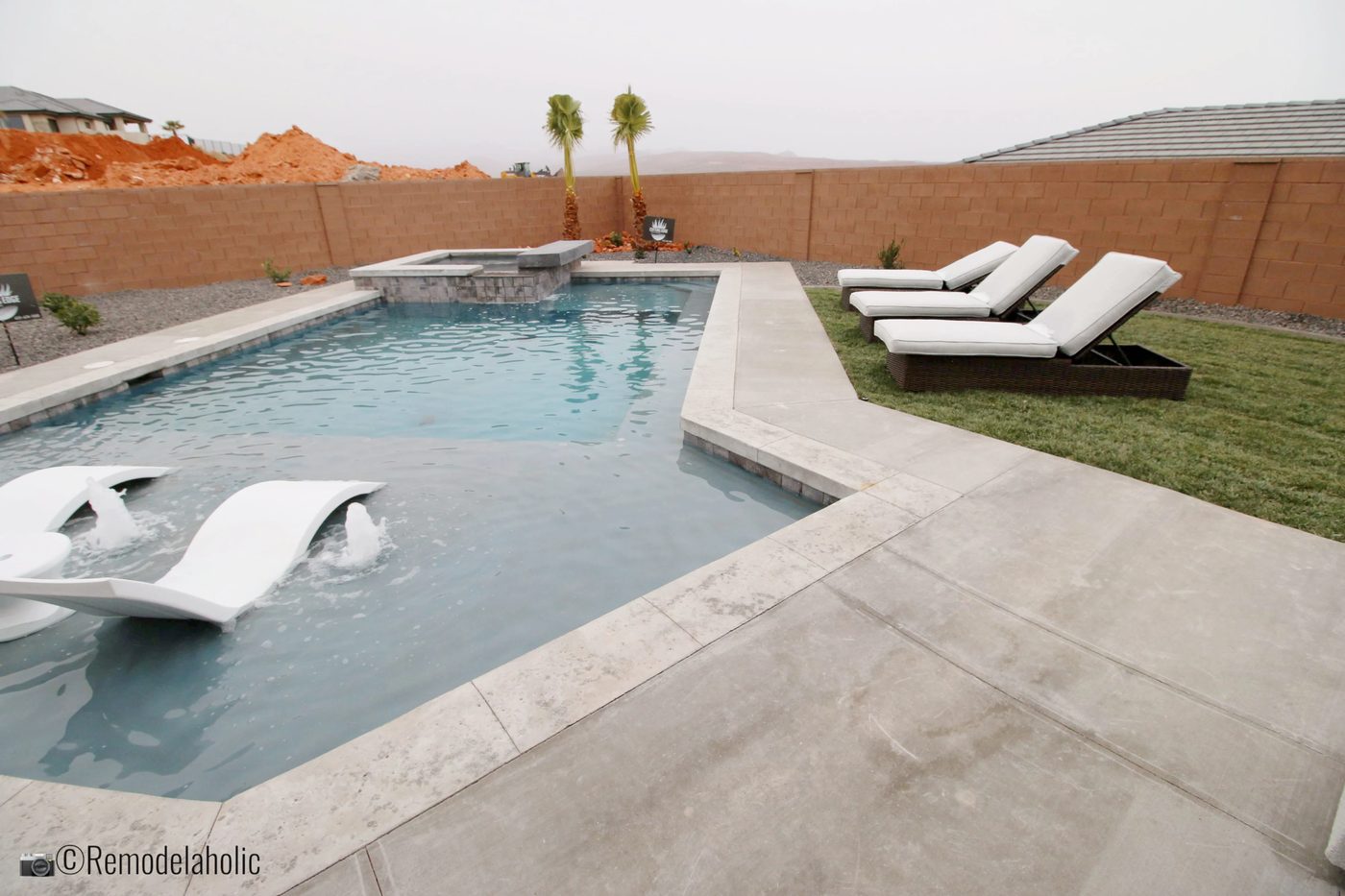 Line up pool chairs near the pool, SGPH 2019 House 12 - DG Ventures, LLC, Photo by Bekob