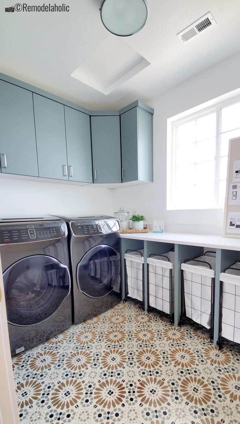 Bold patterned floor in the laundry room with sorting baskets. UVPH 2021 Home 13 Utah Professional Women In Building Designer Allison Campbell Design, Photo by Bekob