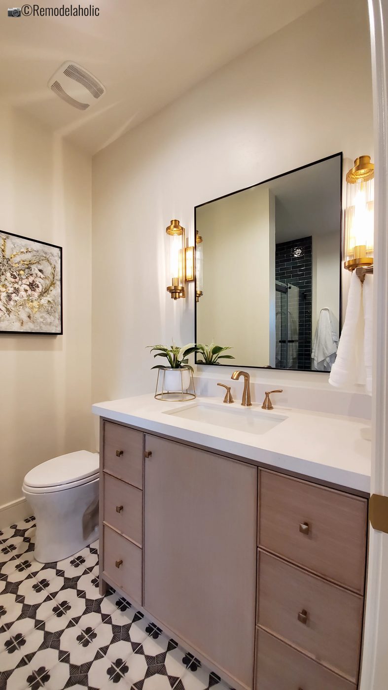 direct patterned floor in a bathroom. UVPH 2021 Home 01 Regent Custom Homes Designer Olsen Homes Interior Design, Photo by Bekob