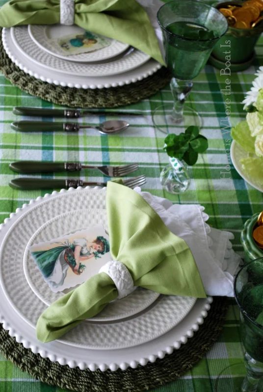St Patrick's Day green table setting with flowers and plaid and vintage printed placecards, Home is Where The Boat Is