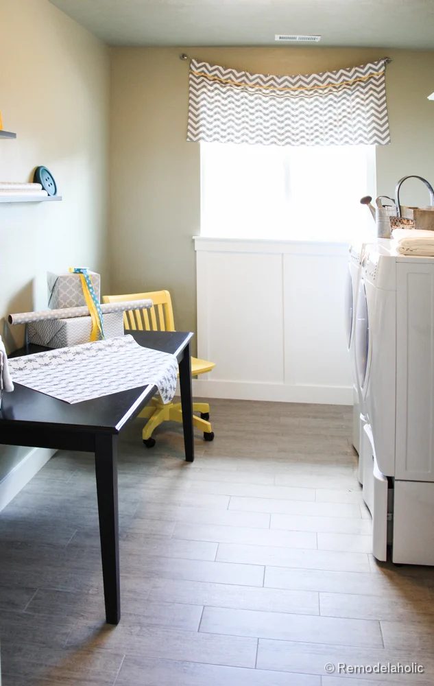 Add a table or desk to a laundry room to add a work station area. Fabulous Laundry room design options from @Bekob