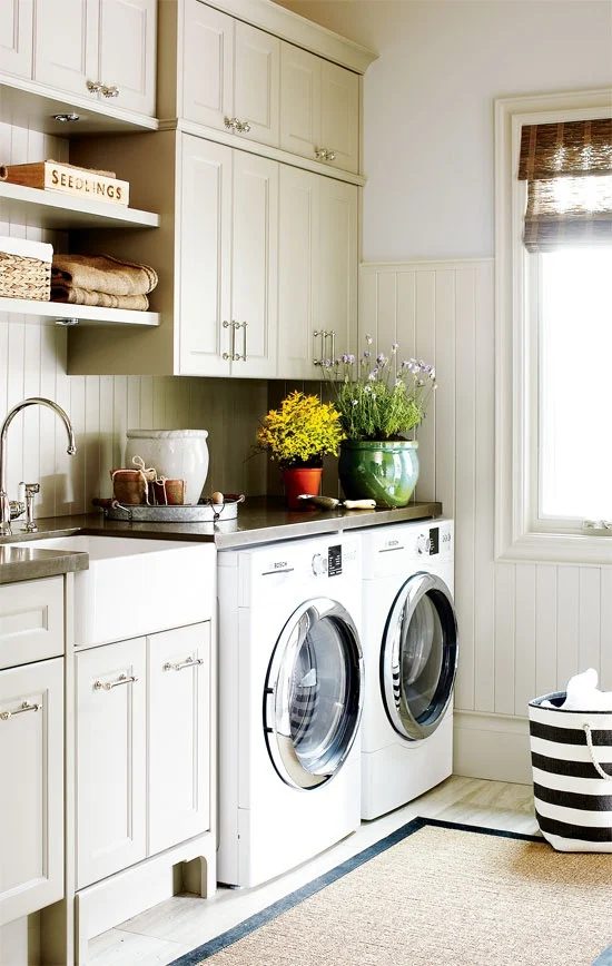 striking millwork and cabinetry laundry room featured on Bekob.com