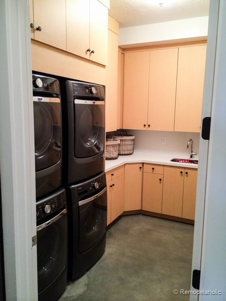 Double stacked machines to move through laundry quickly. Fabulous Laundry room design options from @Bekob