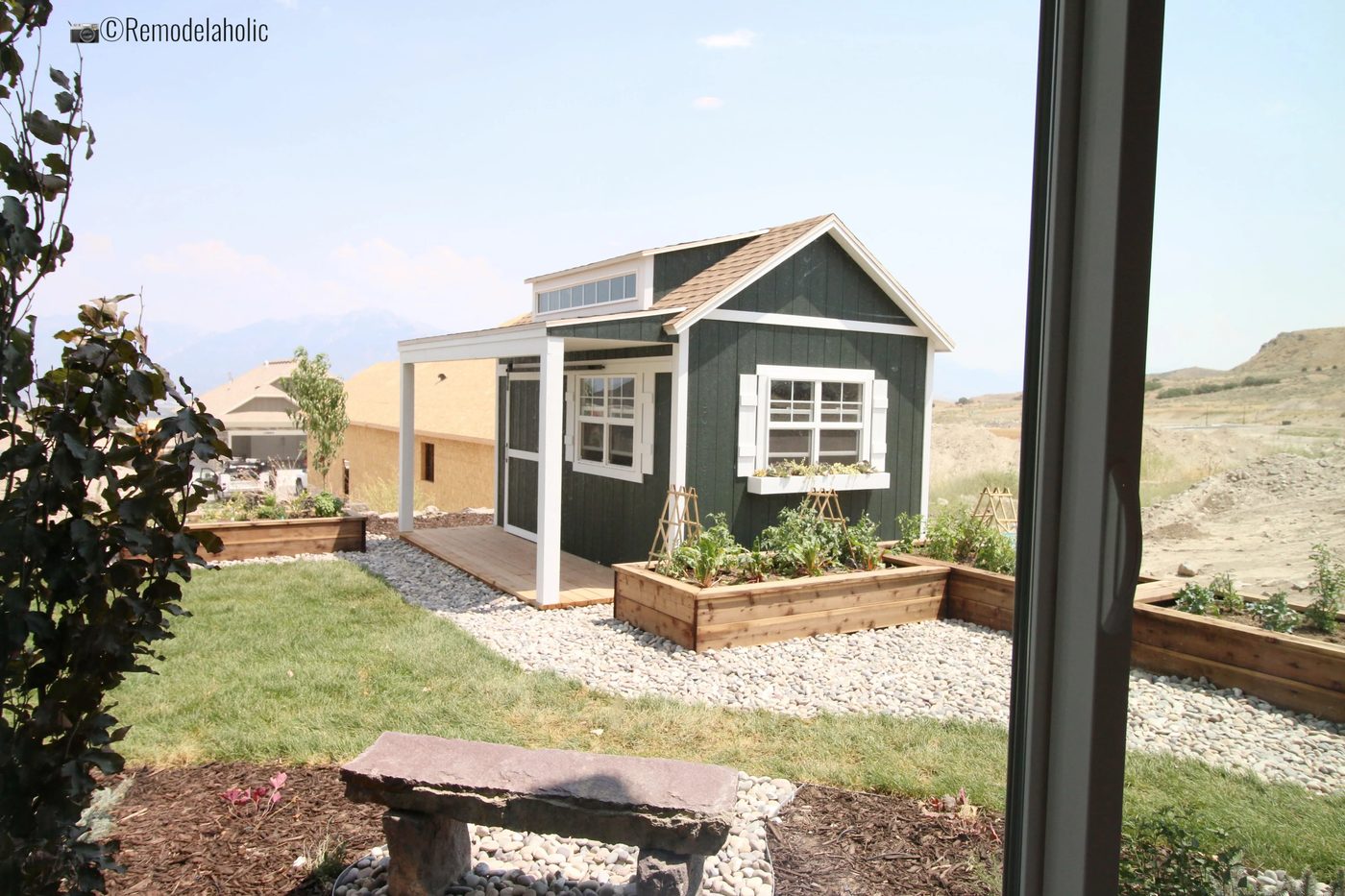 Add garden beds around a storage shed or playhouse in the backyard. SLPH 2018 Home 13 Magleby Communties, Photo by Bekob