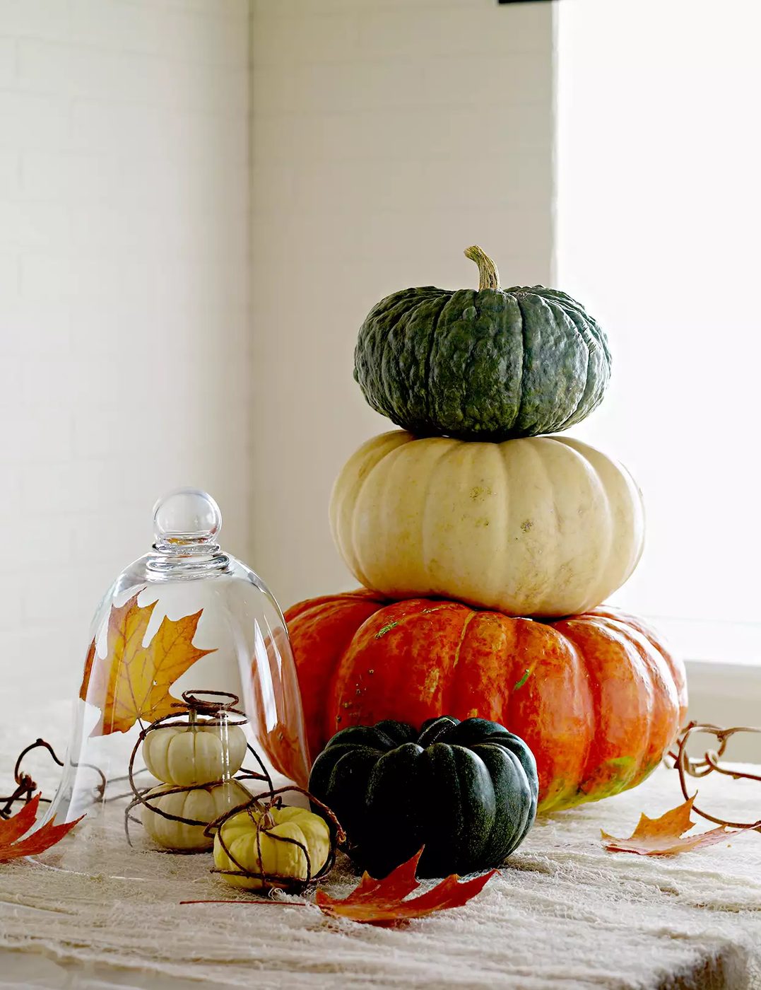 Pumpkins Stacked Table Glass Leaves Branches 82326aa5 408e879955b24d13b9cc9acb1e0590cf