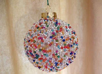 Beaded ornament - Try these 35+ Handmade options for clear glass ornaments to add precious memories and lots of spirit to your Christmas tree! from @tipsaholic #ornaments #handmade
