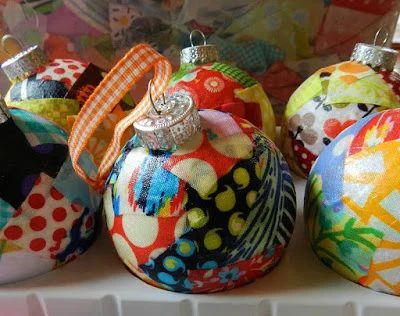 Fabric Covered Ornaments - Try these 35+ Handmade options for clear glass ornaments to add precious memories and lots of spirit to your Christmas tree! from @tipsaholic #ornaments 