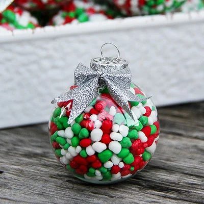 Candy Filled Ornaments - Try these 35+ Handmade options for clear glass ornaments to add precious memories and lots of spirit to your Christmas tree! from @tipsaholic #ornaments #h