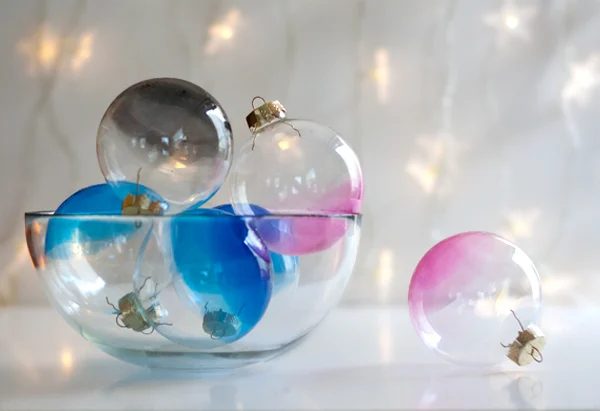 Ombre Glass Ornaments - Try these 35+ Handmade options for clear glass ornaments to add precious memories and lots of spirit to your Christmas tree! from @Bekob #ornaments #handma
