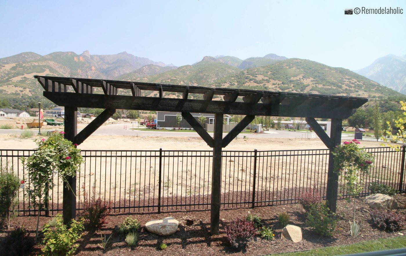 Add an arbor to your backyard for a striking addition to your landscaping, SLPH 2018 Home 5 Regal Homes, Photo by Bekob.com