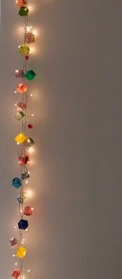 String lights are an inexpensive way to dress up so many areas in the home. Outdoor, indoor, dress them up and more. 36 Clever Ways to Use String Lights via Bekob.com