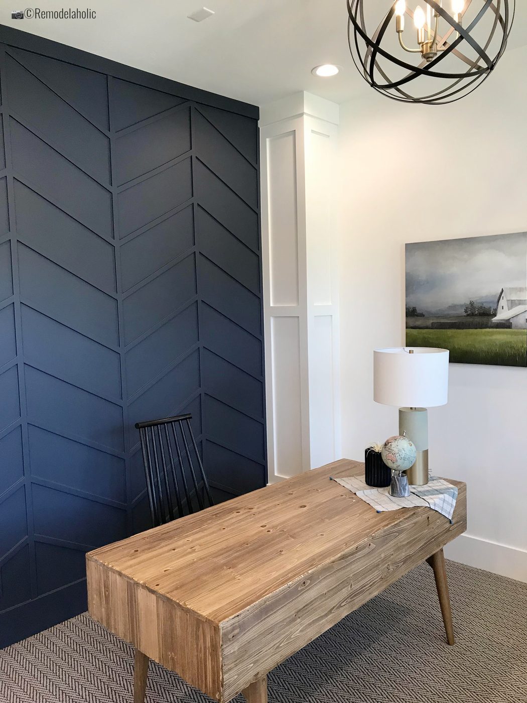 Navy fretwork wall in herringbone in a home office, UVPH 2018 Home 17 Millhaven Homes, Four Chairs Furniture & Design, Photo by Bekob