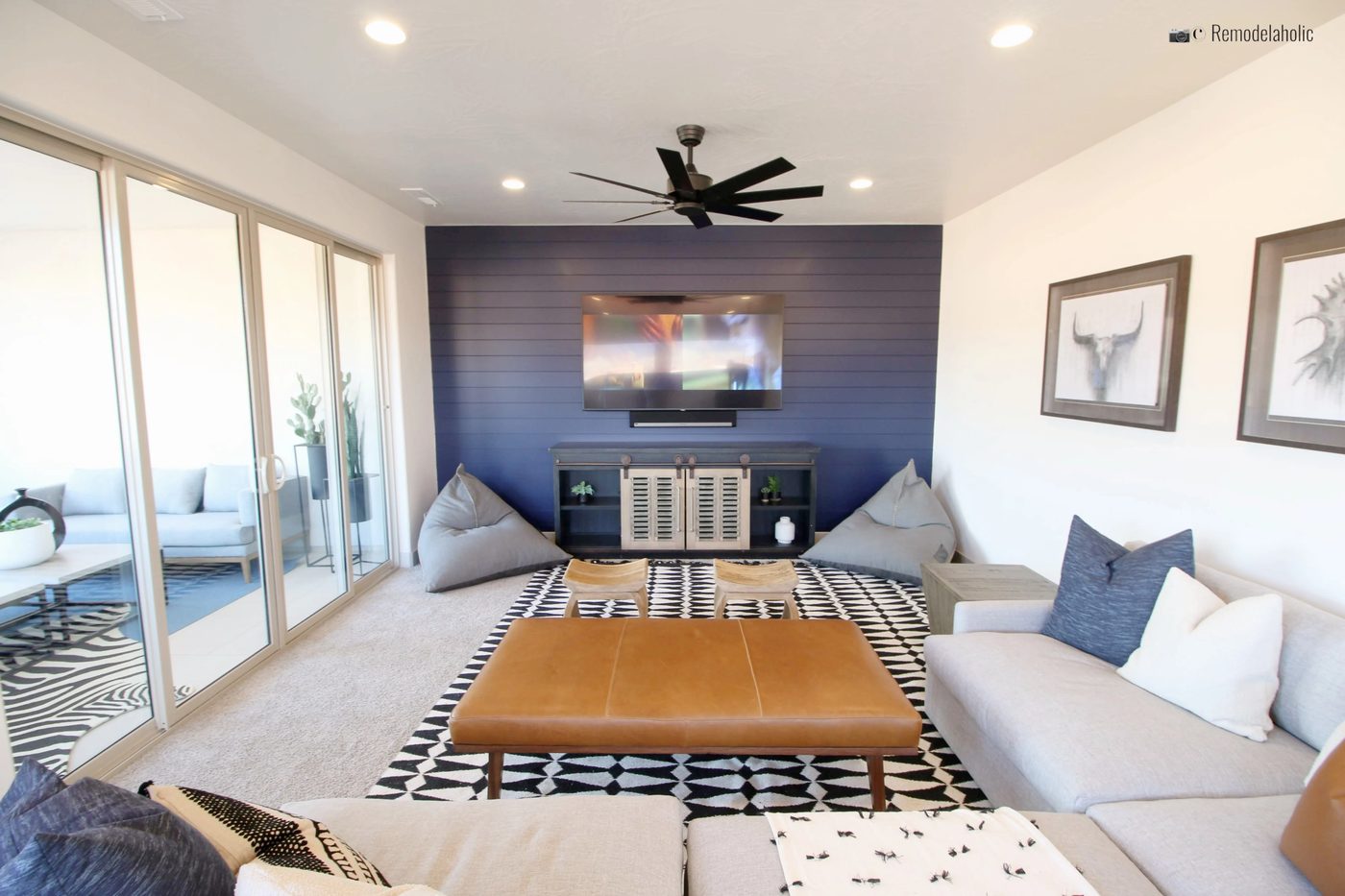 Traditional shiplap in a navy color for a living room feature wall, SGPH 2019 Taylor Built HIRES, Photo by Bekob